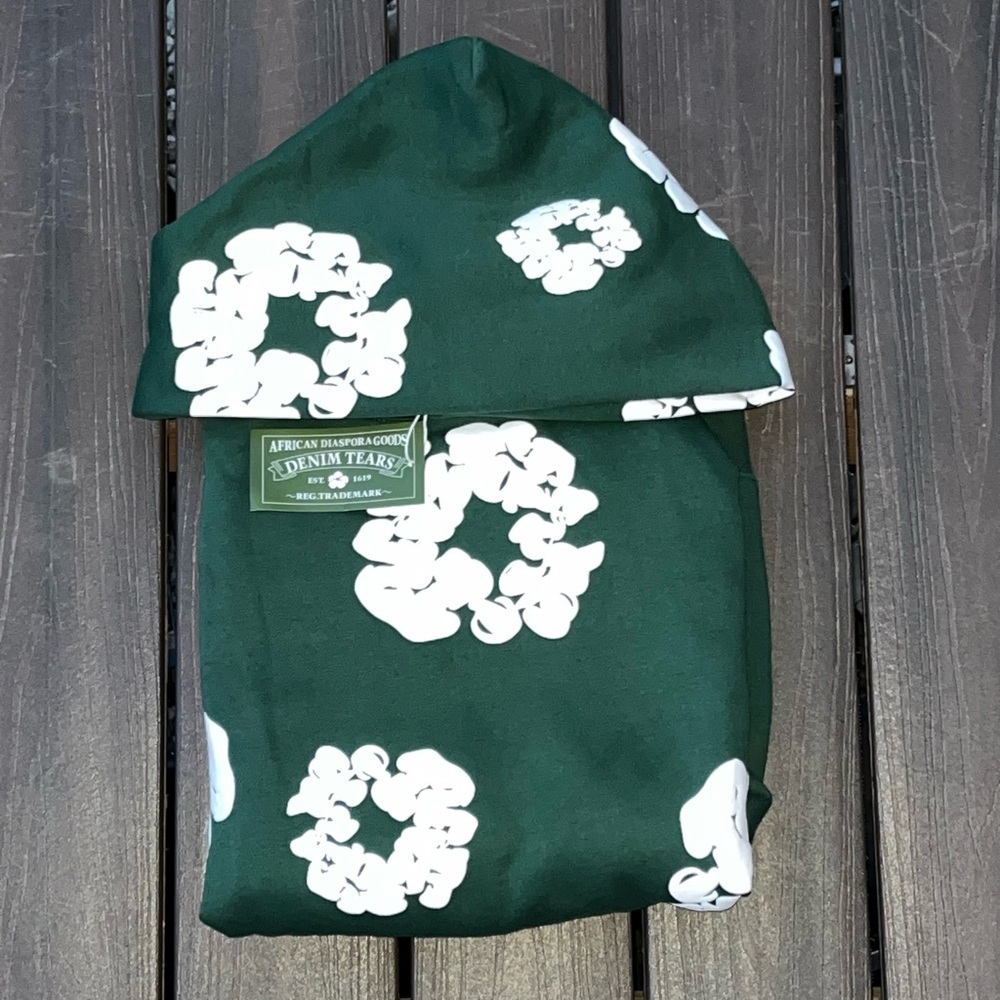 Denim Tears Green Hoodie with White Floral Design